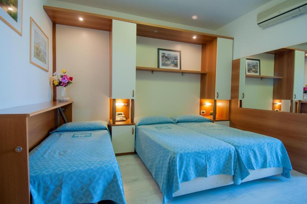 Hotel Ai Pini Grado Habitación foto
